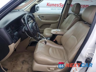 Zdjęcie 7 z 11 samochodu: 2003 MAZDA TRIBUTE ES VIN:4F2CZ06123KM25439 - miniatura