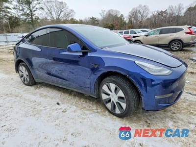 Czwarte zdjęcie samochodu z boku: 2022 TESLA MODEL Y VIN:7SAYGDEEXNF430558 - miniatura