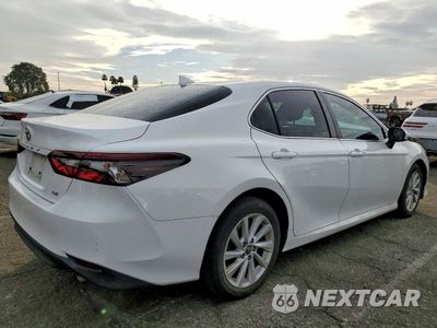 Trzecie zdjęcie samochodu z tyłu: 2021 TOYOTA CAMRY LE VIN:4T1C11AKXMU594817 - miniatura