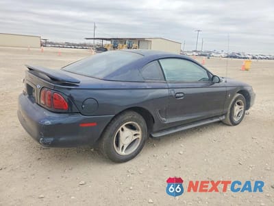 Trzecie zdjęcie samochodu z tyłu: 1997 FORD MUSTANG VIN:1FALP4047VF201438 - miniatura