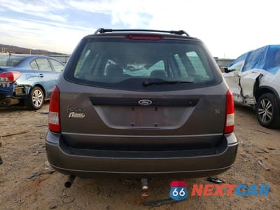 Zdjęcie 6 z 15 samochodu: 2002 FORD FOCUS SE VIN:1FAFP36342W286871 - miniatura