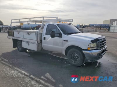 Czwarte zdjęcie samochodu z boku: 2004 FORD F350 SUPER DUTY VIN:1FDWF36L14ED99646 - miniatura