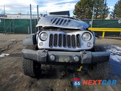 Piąte zdjęcie samochodu w środku: 2018 JEEP WRANGLER UNLIMITED SPORT VIN:1C4HJWDG4JL897785 - miniatura