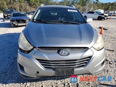 Piąte zdjęcie samochodu w środku: 2012 HYUNDAI TUCSON GLS VIN:KM8JU3AC7CU422004 - miniatura