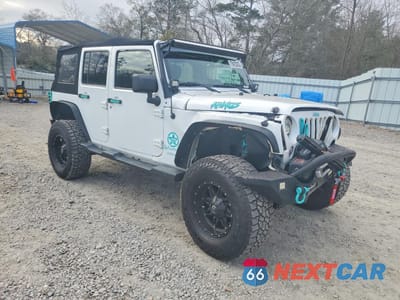 Czwarte zdjęcie samochodu z boku: 2014 JEEP WRANGLER UNLIMITED SPORT VIN:1C4BJWDG7EL208463 - miniatura