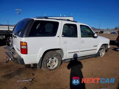 Trzecie zdjęcie samochodu z tyłu: 2002 CHEVROLET TAHOE K1500 VIN:1GNEK13Z12J230960 - miniatura