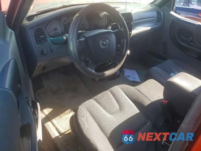 Zdjęcie 8 z 11 samochodu: 2004 MAZDA B4000 CAB PLUS VIN:4F4ZR47EX4TM10287 - miniatura