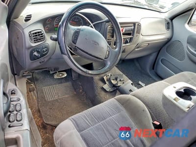 Zdjęcie 8 z 12 samochodu: 2001 FORD F150 SUPERCREW VIN:1FTRW07LX1KC32150 - miniatura