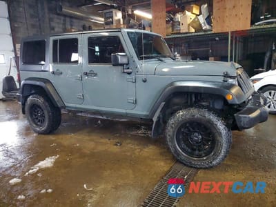 Czwarte zdjęcie samochodu z boku: 2015 JEEP WRANGLER UNLIMITED SPORT VIN:1C4HJWDG0FL656264 - miniatura