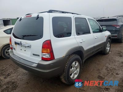 Trzecie zdjęcie samochodu z tyłu: 2003 MAZDA TRIBUTE ES VIN:4F2CZ06123KM25439 - miniatura