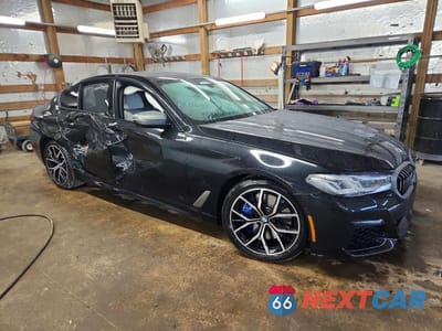 Czwarte zdjęcie samochodu z boku: 2022 BMW M550XI VIN:WBA13BK09NCH97228 - miniatura