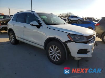 Czwarte zdjęcie samochodu z boku: 2011 VOLKSWAGEN TOUAREG V6 TDI VIN:WVGFK9BP3BD002898 - miniatura
