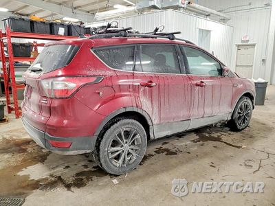 Trzecie zdjęcie samochodu z tyłu: 2018 FORD ESCAPE SEL VIN:1FMCU9HDXJUA97775 - miniatura