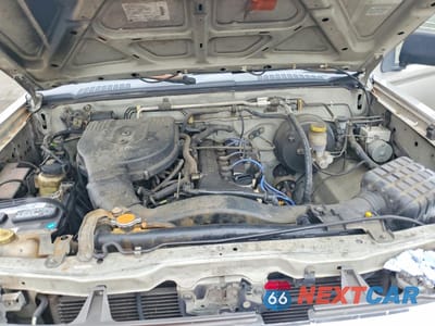 Zdjęcie 11 z 12 samochodu: 2000 NISSAN FRONTIER KING CAB XE VIN:1N6DD26Y8YC384485 - miniatura