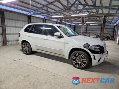 Czwarte zdjęcie samochodu z boku: 2011 BMW X5 XDRIVE50I VIN:5UXZV8C56BL417671 - miniatura