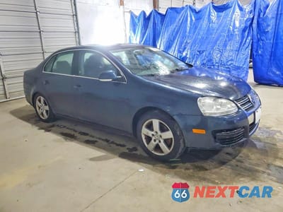 Czwarte zdjęcie samochodu z boku: 2009 VOLKSWAGEN JETTA SE VIN:3VWRZ71K49M090475 - miniatura