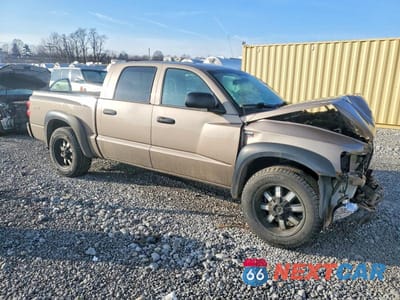 Czwarte zdjęcie samochodu z boku: 2010 DODGE DAKOTA SXT VIN:1D7CW3GP2AS103903 - miniatura