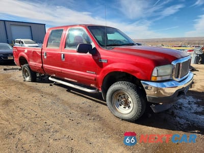 Czwarte zdjęcie samochodu z boku: 2002 FORD F350 SRW SUPER DUTY VIN:1FTSW31F32ED62955 - miniatura