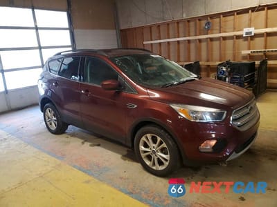 Czwarte zdjęcie samochodu z boku: 2018 FORD ESCAPE SE VIN:1FMCU9GD4JUC77531 - miniatura