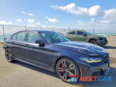 Czwarte zdjęcie samochodu z boku: 2023 BMW M550XI VIN:WBA13BK05PCM32125 - miniatura