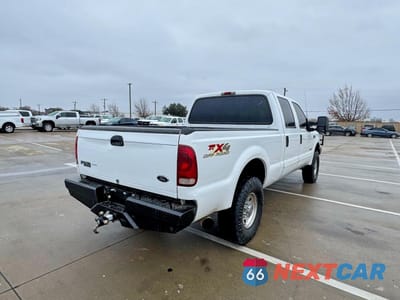 Czwarte zdjęcie samochodu z boku: 2003 FORD F250 SUPER DUTY VIN:1FTNW21P33EC81102 - miniatura