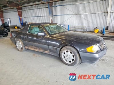 Czwarte zdjęcie samochodu z boku: 1994 MERCEDES-BENZ SL 500 VIN:WDBFA67EXRF090746 - miniatura