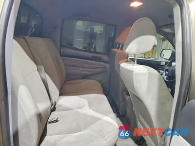 Zdjęcie 10 z 12 samochodu: 2011 TOYOTA TACOMA V6 VIN:3TMLU4ENXBM060686 - miniatura