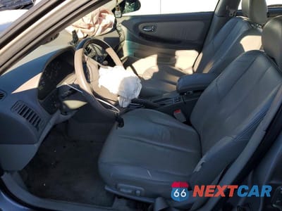 Zdjęcie 7 z 12 samochodu: 2001 NISSAN MAXIMA GXE VIN:JN1CA31A71T112820 - miniatura