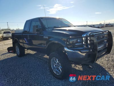 Czwarte zdjęcie samochodu z boku: 2001 FORD F250 SUPER DUTY VIN:1FTNX21F81EB09519 - miniatura