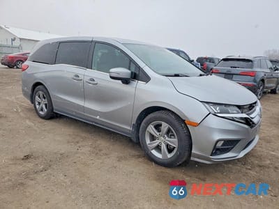 Czwarte zdjęcie samochodu z boku: 2018 HONDA ODYSSEY EXL VIN:5FNRL6H76JB063321 - miniatura
