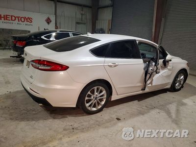 Trzecie zdjęcie samochodu z tyłu: 2019 FORD FUSION SE VIN:3FA6P0HDXKR149134 - miniatura