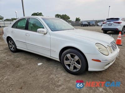 Czwarte zdjęcie samochodu z boku: 2003 MERCEDES-BENZ E 320 VIN:WDBUF65J63A142984 - miniatura