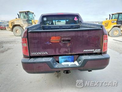 Zdjęcie 6 z 11 samochodu: 2011 HONDA RIDGELINE RTS VIN:5FPYK1F44BB003590 - miniatura
