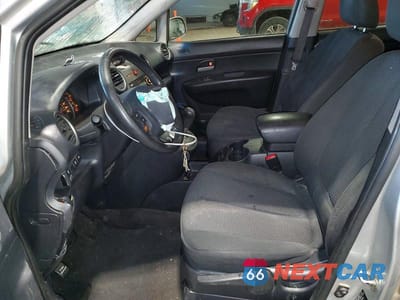 Zdjęcie 7 z 13 samochodu: 2010 KIA RONDO EX VIN:KNAHH8A8XA7327008 - miniatura