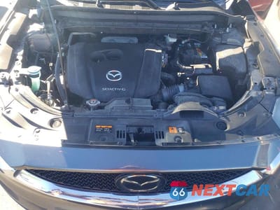 Zdjęcie 12 z 13 samochodu: 2021 MAZDA CX-5 TOURING VIN:JM3KFACMXM1326441 - miniatura