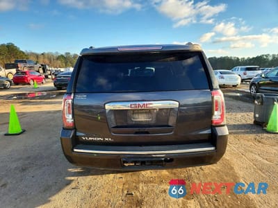 Zdjęcie 6 z 12 samochodu: 2018 GMC YUKON XL DENALI VIN:1GKS1HKJ4JR239904 - miniatura