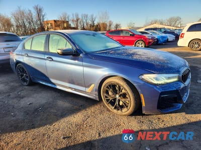 Czwarte zdjęcie samochodu z boku: 2023 BMW M550XI VIN:WBA13BK00PCM25650 - miniatura