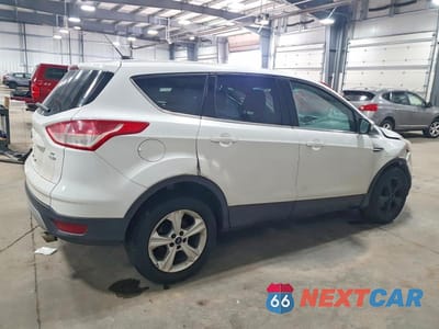 Trzecie zdjęcie samochodu z tyłu: 2014 FORD ESCAPE SE VIN:1FMCU9GX0EUC60533 - miniatura