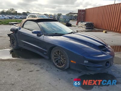 Czwarte zdjęcie samochodu z boku: 2001 PONTIAC FIREBIRD TRANS AM VIN:2G2FV32G612145698 - miniatura