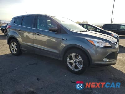 Czwarte zdjęcie samochodu z boku: 2014 FORD ESCAPE SE VIN:1FMCU9G93EUE00561 - miniatura