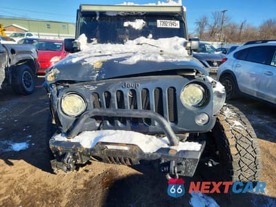 Piąte zdjęcie samochodu w środku: 2016 JEEP WRANGLER UNLIMITED SPORT VIN:1C4BJWDG3GL191843 - miniatura