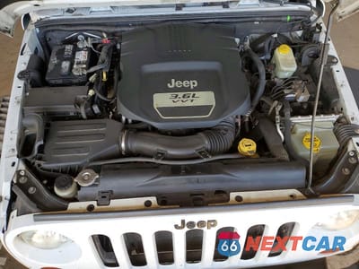 Zdjęcie 11 z 11 samochodu: 2013 JEEP WRANGLER UNLIMITED SAHARA VIN:1C4BJWEG5DL613413 - miniatura