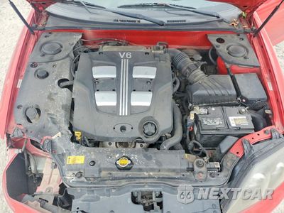 Zdjęcie 11 z 15 samochodu: 2003 HYUNDAI TIBURON GT VIN:KMHHN65F93U092142 - miniatura