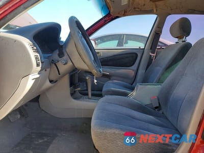 Zdjęcie 7 z 12 samochodu: 2001 TOYOTA COROLLA LE VIN:1NXBR12E31Z439857 - miniatura