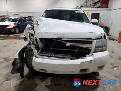 Piąte zdjęcie samochodu w środku: 2011 CHEVROLET TAHOE K1500 LT VIN:1GNSKBE0XBR346635 - miniatura