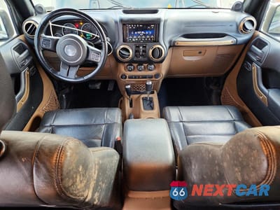 Zdjęcie 8 z 13 samochodu: 2011 JEEP WRANGLER UNLIMITED SAHARA VIN:1J4BA5H12BL578628 - miniatura