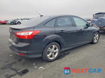 Trzecie zdjęcie samochodu z tyłu: 2014 FORD FOCUS SE VIN:1FADP3F26EL156403 - miniatura