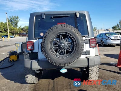 Zdjęcie 6 z 12 samochodu: 2014 JEEP WRANGLER UNLIMITED SPORT VIN:1C4BJWDG7EL156610 - miniatura