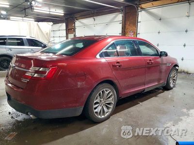Trzecie zdjęcie samochodu z tyłu: 2014 FORD TAURUS LIMITED VIN:1FAHP2F80EG117881 - miniatura