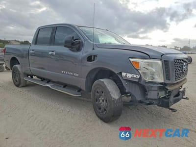 Czwarte zdjęcie samochodu z boku: 2016 NISSAN TITAN XD S VIN:1N6BA1F14GN517646 - miniatura